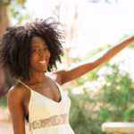 smiling-black-woman-relaxing-park_1262-6250